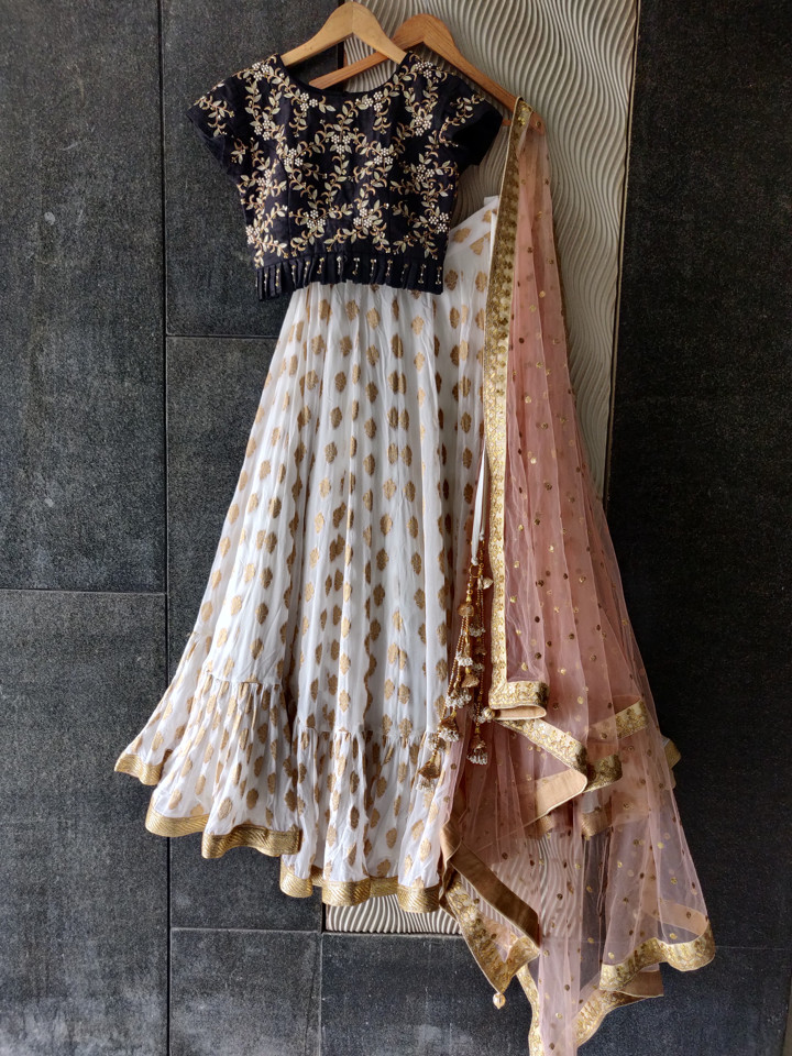 Cream Color Crop top Ruffle Blouse With Lehenga at Rs.4999/Piece in  haldwani offer by Manglam Sarees