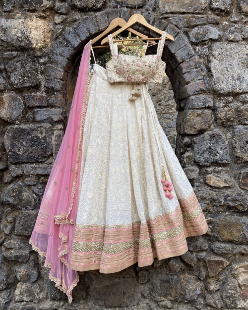 Ivory And Rose Pink Lucknowi Lehenga Set - Priti Sahni- Fabilicious Fashion